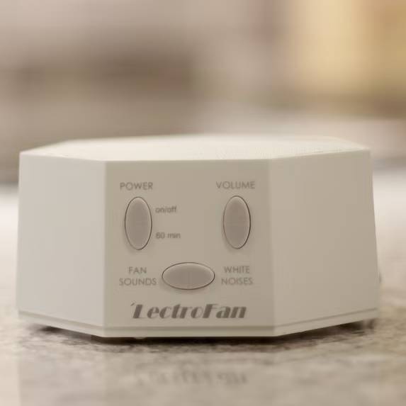 This LectroFan Sound Machine creates a relaxing environment in apartments, baby nurseries and hotel rooms. It helps to drown out noisy neighbors, traffic or other noises so you can get the sleep that you deserve. This machine features 10 non-repeating unique fan sounds and 10 non-repeating unique white noise sounds. It also has a multilevel adjustable volume and 60-minute sleep timer so you can customize the settings. The small size makes it ideal for travel and it can be plugged into a computer or AC adapter (included). This portable sound machine also has a sleek style that helps it blend with all types of decor.